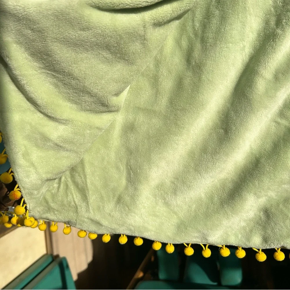 Green aloha print beach blanket